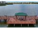Waterfront deck features seating and scenic views at 6414 Moorings Point Cir # 201, Lakewood Ranch, FL 34202