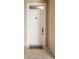 White front door with a decorative doormat at 7612 Lake Vista Ct # 405, Lakewood Ranch, FL 34202