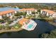 Aerial view showcasing community and lake views at 7612 Lake Vista Ct # 405, Lakewood Ranch, FL 34202