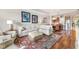 Open living and dining area with hardwood floors at 7612 Lake Vista Ct # 405, Lakewood Ranch, FL 34202