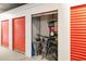 Storage unit with shelving, bicycle and luggage at 7612 Lake Vista Ct # 405, Lakewood Ranch, FL 34202