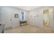 Bright entryway with tile floors and a view into the bathroom at 203 65Th E Ave, Bradenton, FL 34203