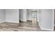 Bright and spacious hallway with luxury vinyl plank flooring, leading to other rooms at 14312 Barbarossa Ln, Port Charlotte, FL 33981