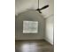 Bright bedroom with vaulted ceiling, large window, and wood-look floors at 6414 Moorings Point Cir # 201, Lakewood Ranch, FL 34202