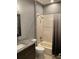Bathroom includes a bathtub, shower, and granite countertop at 6414 Moorings Point Cir # 201, Lakewood Ranch, FL 34202