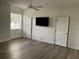 Bright and airy bedroom with hardwood floors and neutral colors at 6414 Moorings Point Cir # 201, Lakewood Ranch, FL 34202