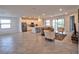 Open concept living area with kitchen and living room at 5707 N Honore Ave # 621, Sarasota, FL 34243