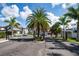 Gated community entrance with lush landscaping at 5707 N Honore Ave # 621, Sarasota, FL 34243