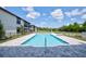 Inviting community pool with ample deck space for lounging at 5707 N Honore Ave # 621, Sarasota, FL 34243