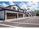 Row of townhouses with brown garage doors at 5707 N Honore Ave # 621, Sarasota, FL 34243