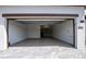 Attached garage with epoxy flooring at 5707 N Honore Ave # 621, Sarasota, FL 34243