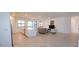 Open floor plan connecting kitchen, living room at 5707 N Honore Ave # 621, Sarasota, FL 34243
