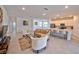 Open concept living space, kitchen, and island at 5707 N Honore Ave # 621, Sarasota, FL 34243