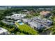 Aerial view of community with lake and pool at 5707 N Honore Ave # 621, Sarasota, FL 34243