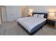 Spacious bedroom with carpeted floors and ample natural light at 5707 N Honore Ave # 621, Sarasota, FL 34243