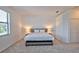 Spacious bedroom with large window and bed at 5707 N Honore Ave # 621, Sarasota, FL 34243