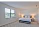 Bright bedroom with large window and plush bed at 5707 N Honore Ave # 621, Sarasota, FL 34243