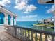 Balcony overlooking the water and neighboring properties at 596 Yawl Ln, Longboat Key, FL 34228