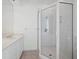 Elegant bathroom with a large corner shower at 596 Yawl Ln, Longboat Key, FL 34228