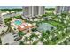Community features a pool, tennis courts, and lush landscaping at 3080 Grand Bay Blvd # 532, Longboat Key, FL 34228
