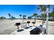 Beachfront BBQ grills with picnic tables at 3080 Grand Bay Blvd # 532, Longboat Key, FL 34228