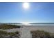 Sandy beach access path to the ocean at 3080 Grand Bay Blvd # 532, Longboat Key, FL 34228