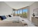 Main bedroom with water view and ample natural light at 3080 Grand Bay Blvd # 532, Longboat Key, FL 34228