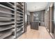 Spacious walk-in closet with ample shelving and lighting at 214 S Renellie Dr, Tampa, FL 33609