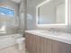 Modern bathroom with a tub, shower, and vanity at 214 S Renellie Dr, Tampa, FL 33609