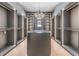 Large walk-in closet with center island and lighting at 214 S Renellie Dr, Tampa, FL 33609