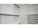Bright, spacious closet with hanging rods and shelves at 214 S Renellie Dr, Tampa, FL 33609