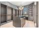 Spacious walk-in closet with ample shelving and hanging space at 214 S Renellie Dr, Tampa, FL 33609