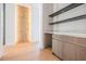Modern wet bar with sleek cabinetry and marble countertops at 214 S Renellie Dr, Tampa, FL 33609