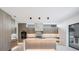 Modern kitchen with large island, marble countertops, and stainless steel appliances at 214 S Renellie Dr, Tampa, FL 33609