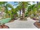 Two shuffleboard courts surrounded by palm trees at 1020 Sun N Sea Dr # 102, Sarasota, FL 34242