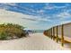 Convenient boardwalk leading to a sandy beach at 1020 Sun N Sea Dr # 102, Sarasota, FL 34242