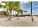 Beachfront view with kayaks and paddleboards at 1020 Sun N Sea Dr # 102, Sarasota, FL 34242