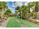 Enjoy a game of shuffleboard in the tropical gardens at 1020 Sun N Sea Dr # 102, Sarasota, FL 34242