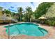 Inviting community pool with ample lounge space at 1020 Sun N Sea Dr # 102, Sarasota, FL 34242