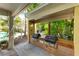 Two built-in grills in a covered outdoor kitchen at 1020 Sun N Sea Dr # 102, Sarasota, FL 34242