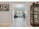 Home office with hardwood floors, large window, and built-in shelving at 4952 Surfside Cir, Bradenton, FL 34211