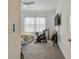 Bedroom with two twin beds, exercise bike, and TV at 4952 Surfside Cir, Bradenton, FL 34211