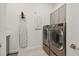 Laundry room with washer, dryer, and cabinets at 4952 Surfside Cir, Bradenton, FL 34211