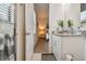 Bathroom with a walk-in shower, toilet and vanity at 4952 Surfside Cir, Bradenton, FL 34211