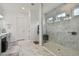 Spa-like bathroom featuring a walk-in shower and double vanity at 4952 Surfside Cir, Bradenton, FL 34211