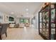 Open living room with white sectional sofa and large TV at 4952 Surfside Cir, Bradenton, FL 34211