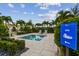 Spa entrance with a clear sign and tranquil landscaping at 4952 Surfside Cir, Bradenton, FL 34211