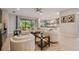 Open concept living room with kitchen and dining area views at 4952 Surfside Cir, Bradenton, FL 34211