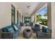 Relaxing outdoor lounge area with comfortable seating and tropical views at 4952 Surfside Cir, Bradenton, FL 34211