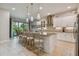 Modern kitchen with white cabinets and granite countertops at 4952 Surfside Cir, Bradenton, FL 34211
